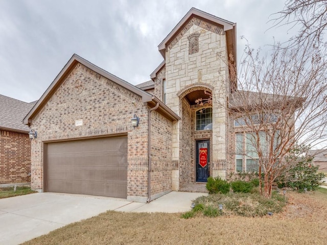 view of front of property featuring a garage