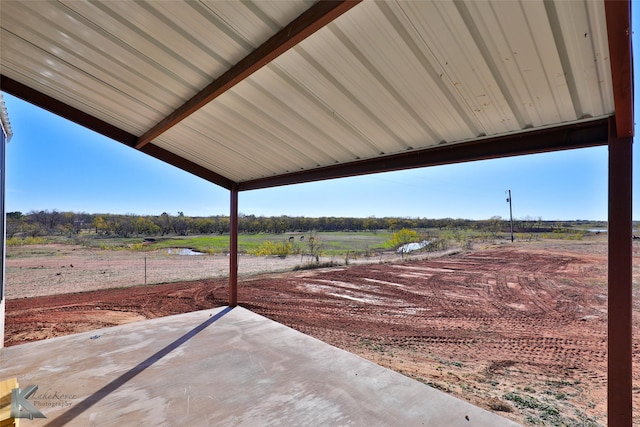 view of patio with a rural view