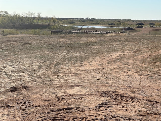 exterior space featuring a water view and a rural view