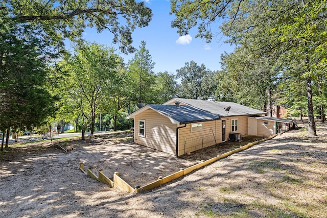 view of home's exterior with central air condition unit