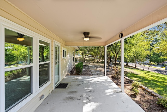 view of patio / terrace featuring ceiling fan