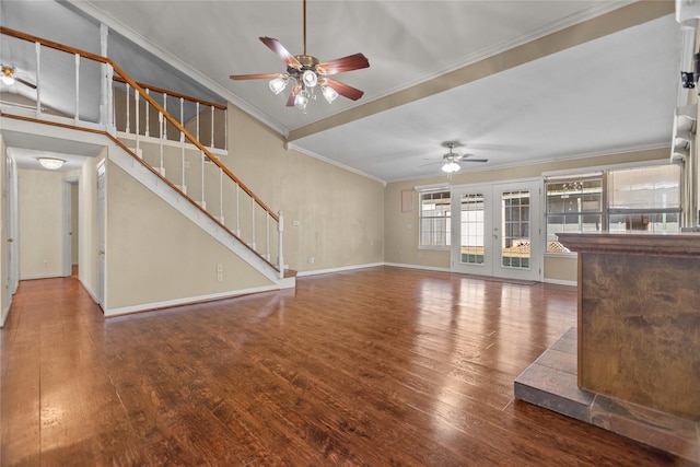 unfurnished living room with hardwood / wood-style floors, lofted ceiling, ornamental molding, ceiling fan, and french doors