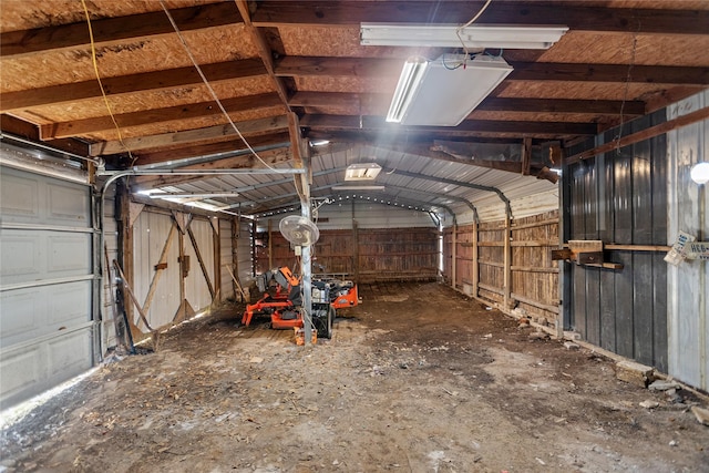 garage with wood walls