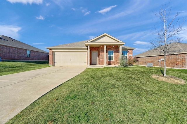 view of front of house featuring a garage, central AC unit, and a front yard