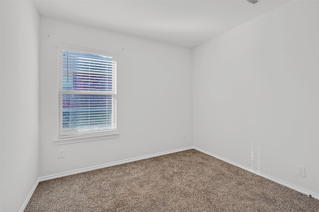 view of carpeted spare room