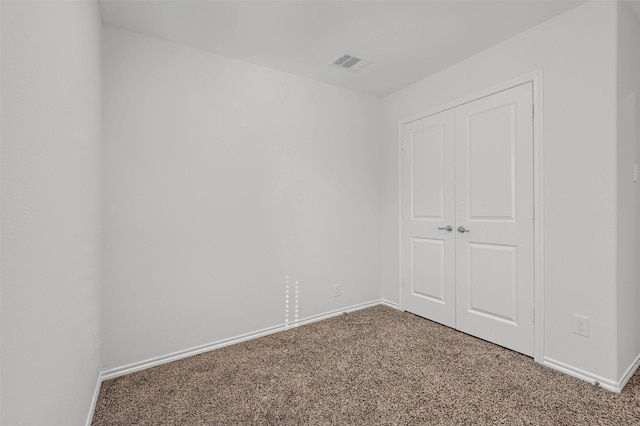 empty room with carpet floors