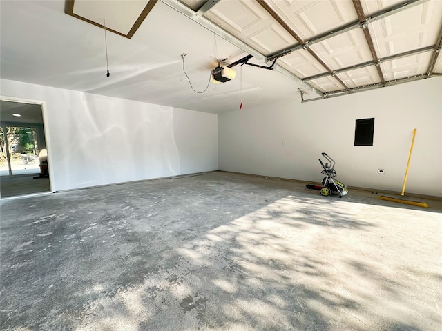 garage featuring a garage door opener