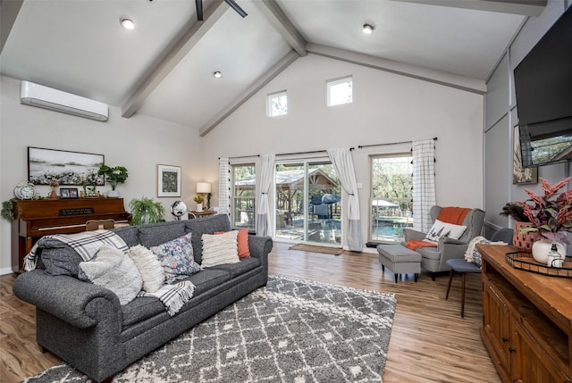 living room featuring beamed ceiling, wood-type flooring, a wall mounted air conditioner, and high vaulted ceiling