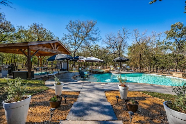 view of pool featuring a gazebo and a patio