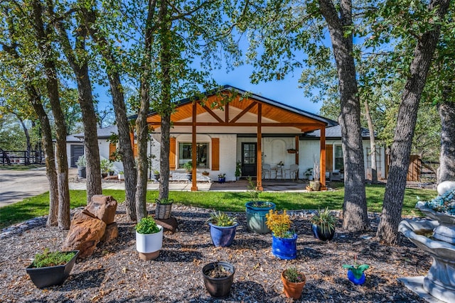 back of house featuring a patio