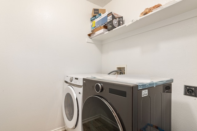 laundry area featuring separate washer and dryer