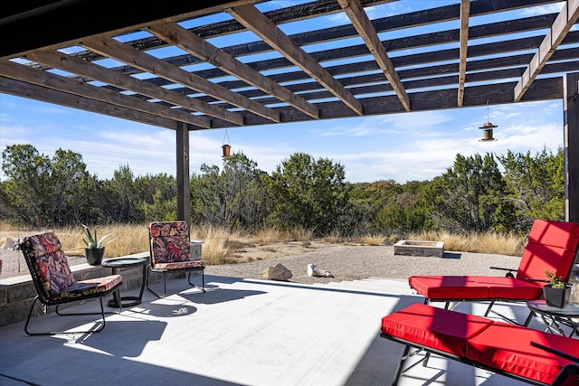 view of patio featuring a pergola