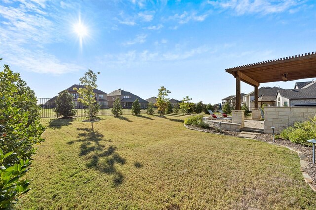 view of yard with a pergola