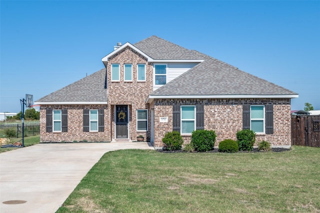 view of front of property with a front lawn