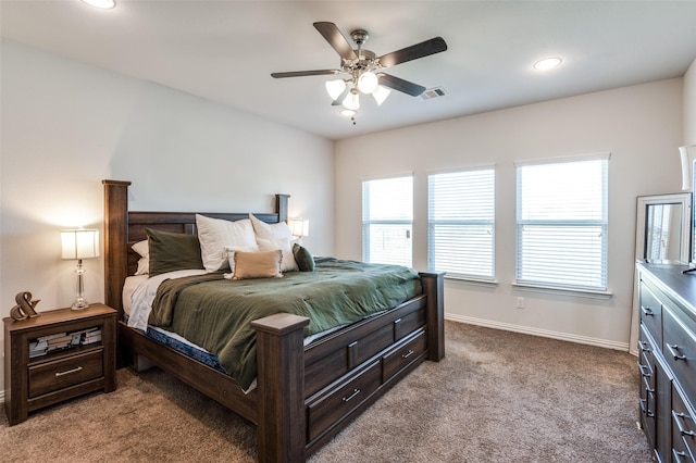 carpeted bedroom with ceiling fan