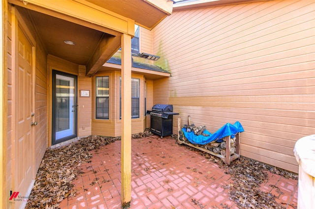 view of patio featuring a grill