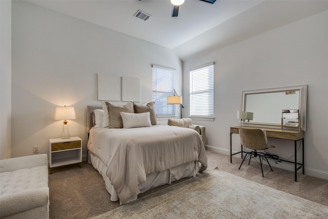 bedroom featuring carpet flooring, vaulted ceiling, and ceiling fan