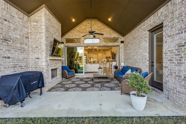 view of patio / terrace featuring an outdoor living space with a fireplace, ceiling fan, and a grill