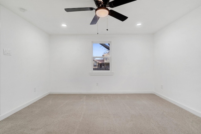 unfurnished room featuring carpet flooring and ceiling fan