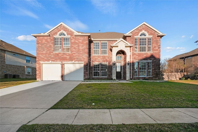 front of property with central AC unit, a garage, and a front yard