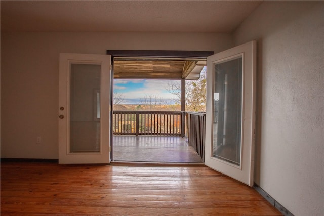 doorway featuring hardwood / wood-style flooring