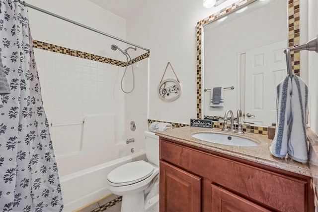 full bathroom featuring vanity, shower / bath combo, and toilet