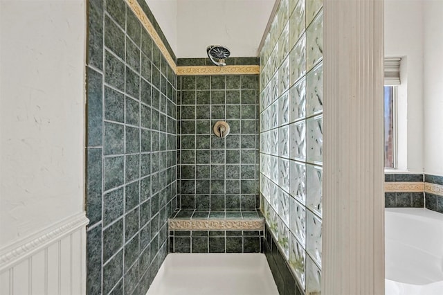 bathroom with tiled shower