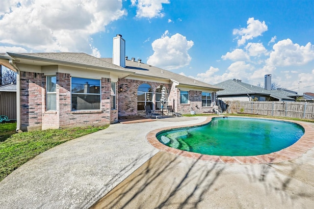 view of pool featuring a patio