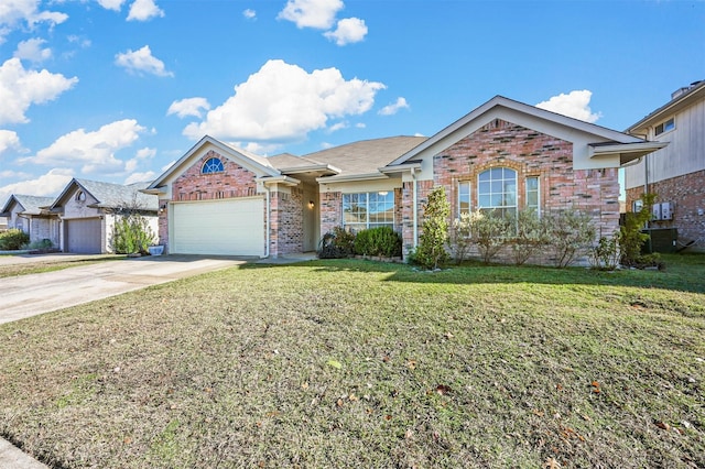 ranch-style house with a front yard and a garage