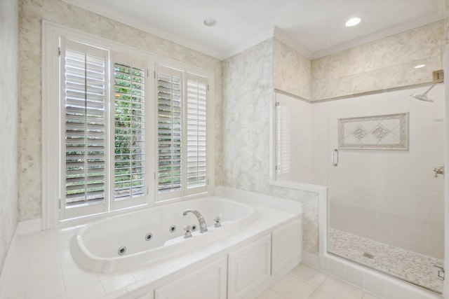 bathroom featuring tile patterned flooring, separate shower and tub, and a wealth of natural light