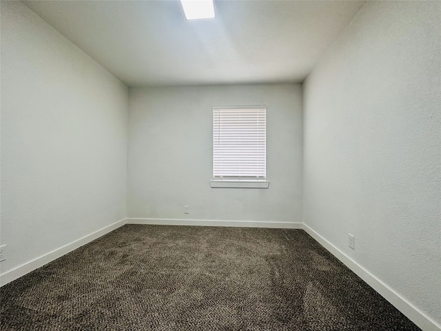 empty room featuring carpet flooring