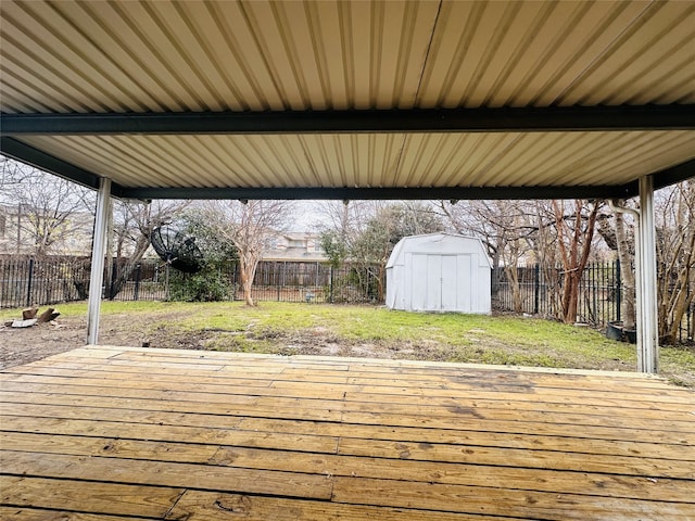 wooden deck with a storage unit