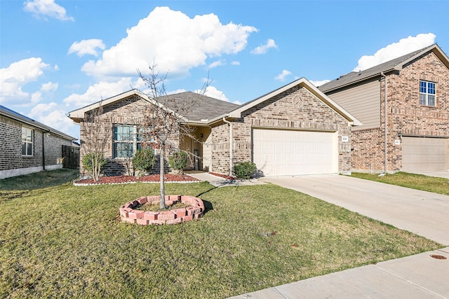 view of front of property featuring a front yard and a garage