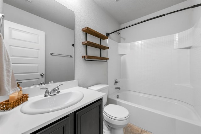 full bathroom with toilet, a textured ceiling, shower / tub combination, and vanity