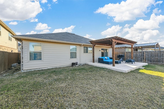 rear view of house with a lawn, a patio area, and a pergola