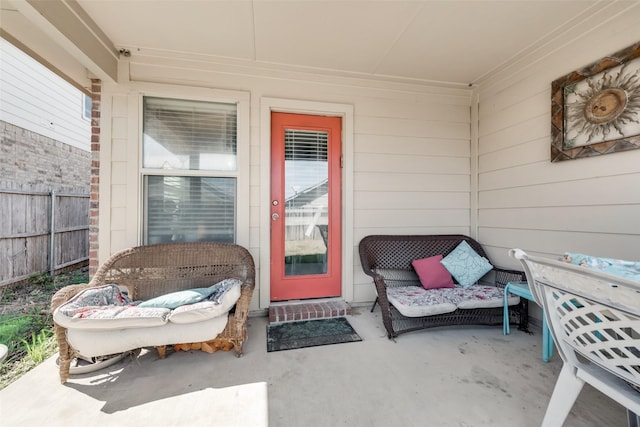 property entrance featuring a patio area