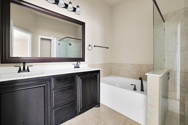 bathroom with vanity, tile patterned floors, and independent shower and bath