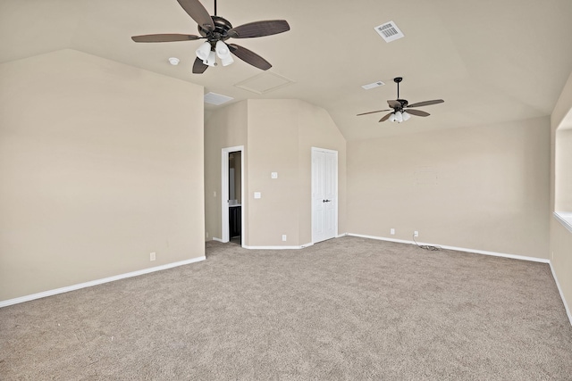 carpeted empty room featuring lofted ceiling and ceiling fan