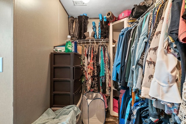 walk in closet featuring visible vents