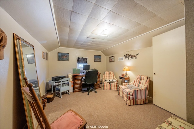 office space with carpet flooring and vaulted ceiling