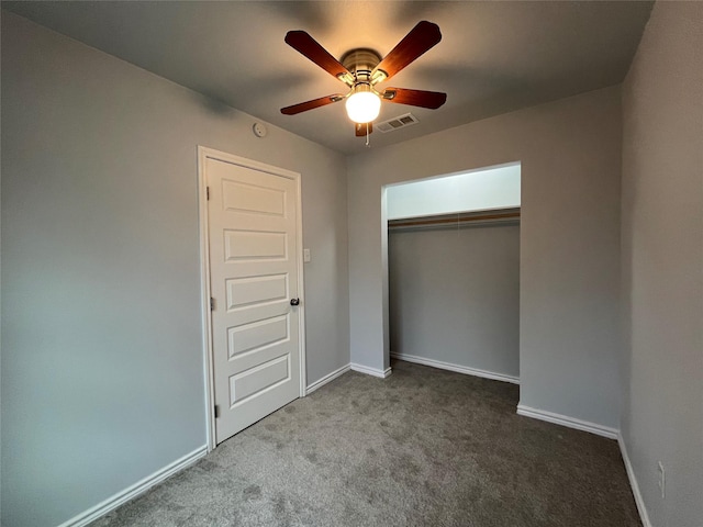 unfurnished bedroom with carpet floors, a closet, and ceiling fan