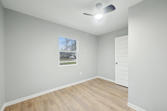 spare room with ceiling fan and light hardwood / wood-style flooring