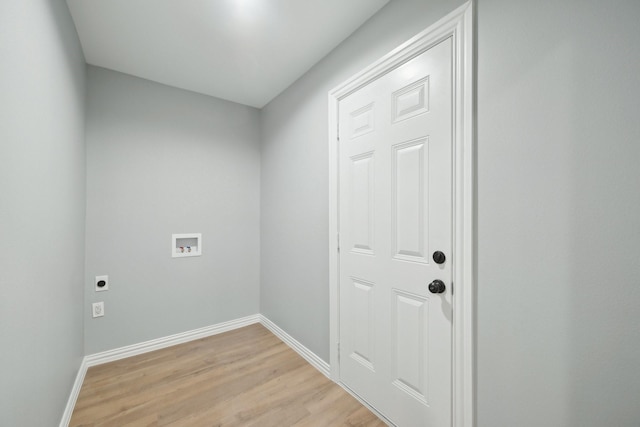 washroom with washer hookup, light hardwood / wood-style flooring, and electric dryer hookup