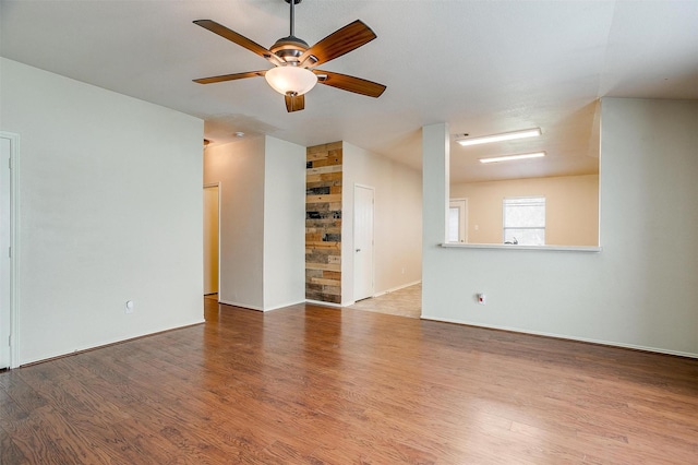 unfurnished room featuring wood-type flooring and ceiling fan