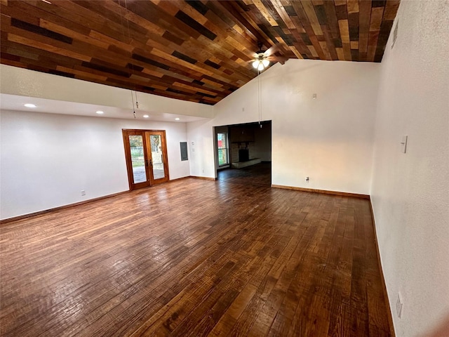 unfurnished living room with wood ceiling, ceiling fan, high vaulted ceiling, wood-type flooring, and french doors