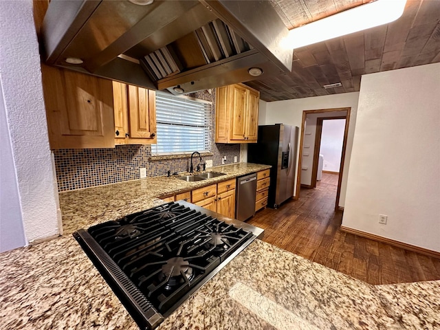 kitchen with sink, backsplash, stainless steel appliances, dark hardwood / wood-style floors, and light stone counters