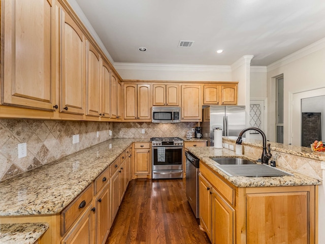 kitchen with crown molding, sink, tasteful backsplash, dark hardwood / wood-style flooring, and stainless steel appliances