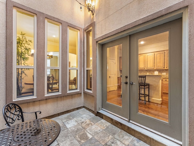 property entrance with french doors