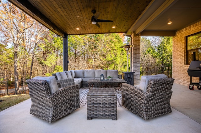 view of patio featuring an outdoor hangout area and ceiling fan