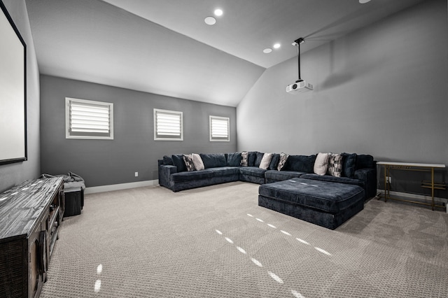 carpeted living room featuring lofted ceiling